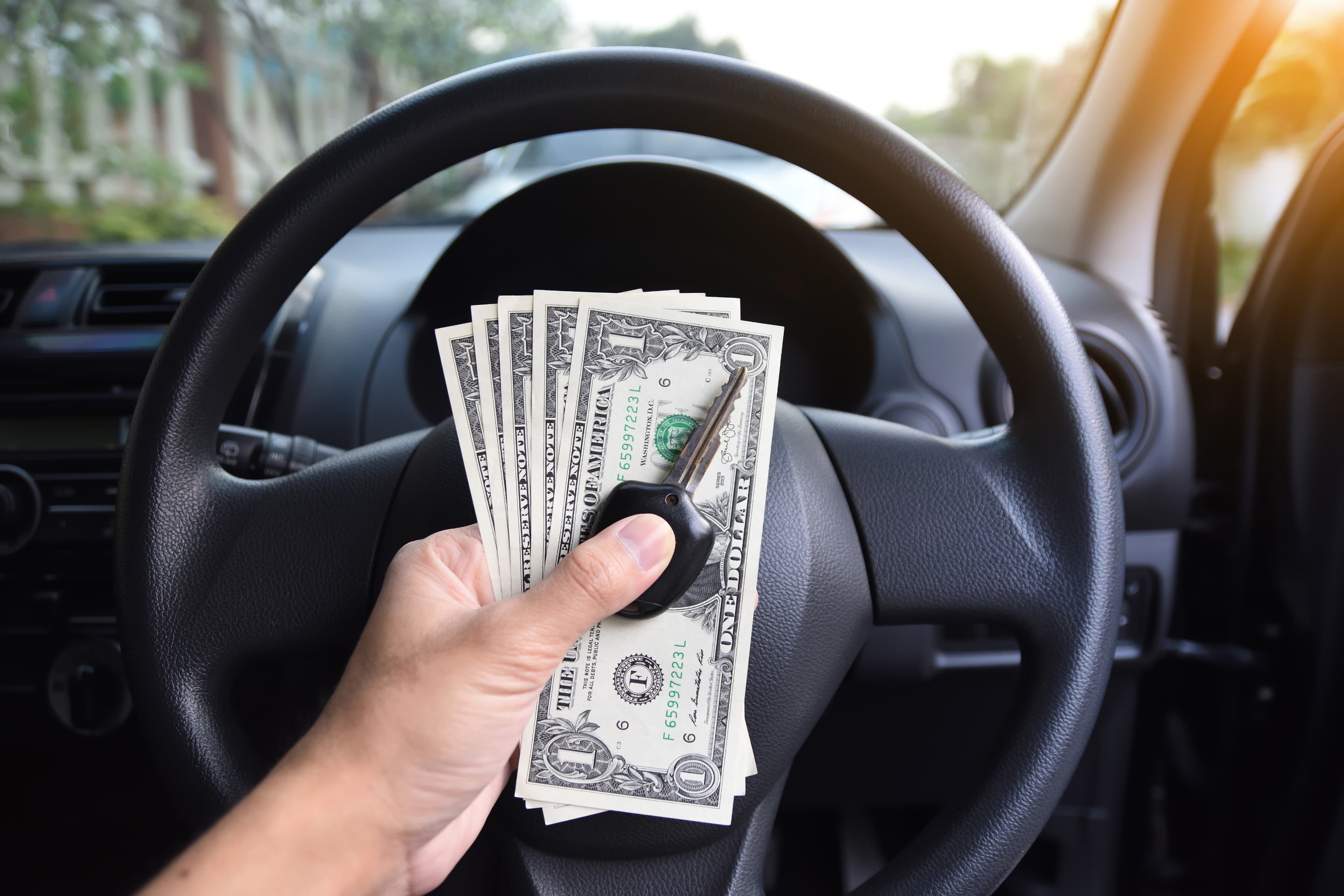 Earnings from driving: cash and keys at the wheel